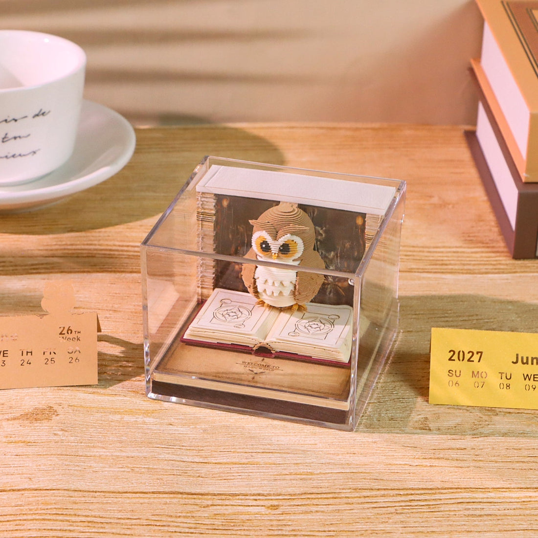 Hedwig calendar inside its acrylic display case